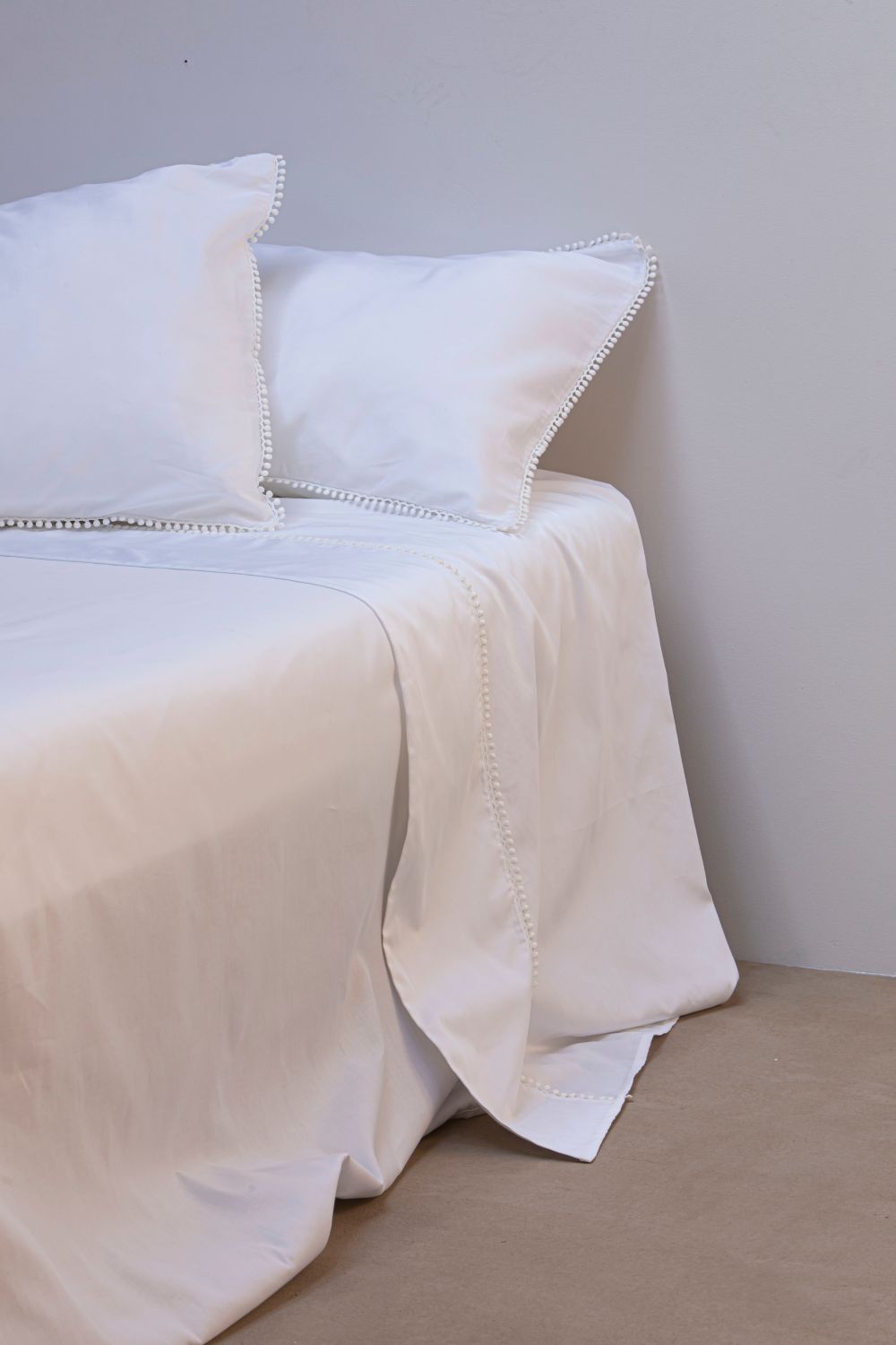 MAAT pure cotton satin pillowcase with pompon trimming (2 pieces)