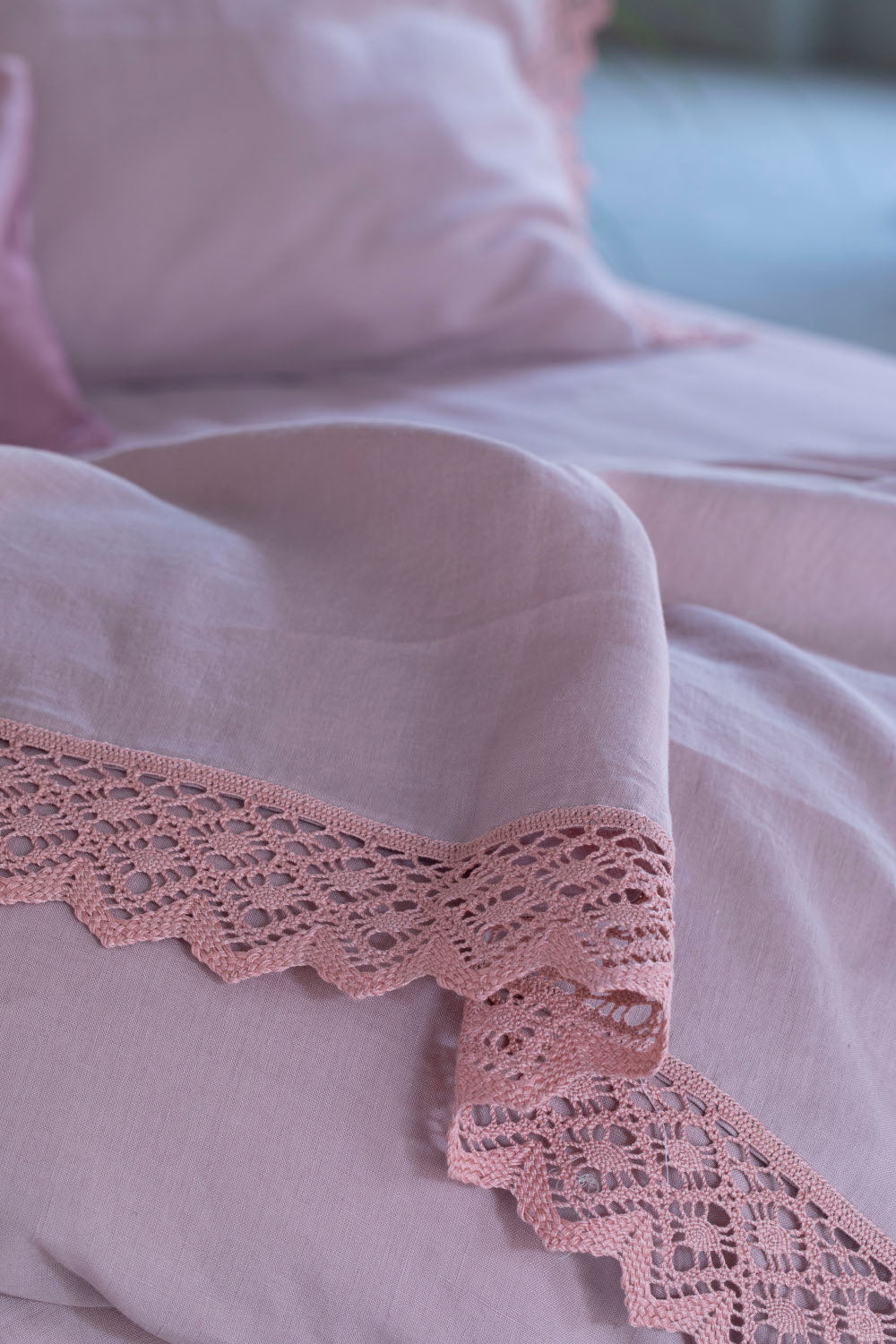 ATENA-Pure washed-linen sheets, trimmed with cotton macrame.  